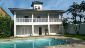 Casa com 4 suites, piscina, churrasqueira, Wi-Fi, Ar Condicionado - Proximo Praia Mar Casado e Pernambuco - Guaruja -